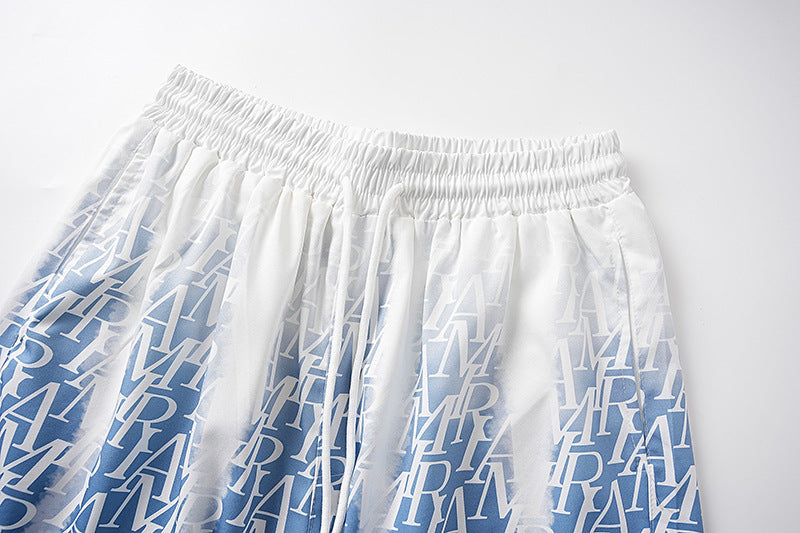 AMRI logo-print gradient silk shorts