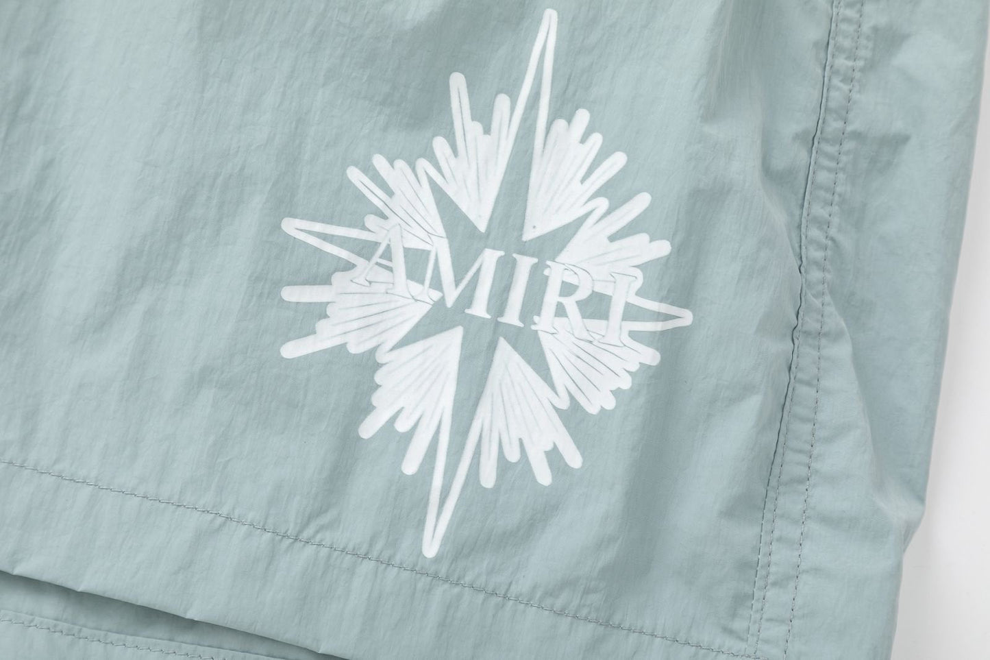 AMRI Starburst logo shell swim shorts